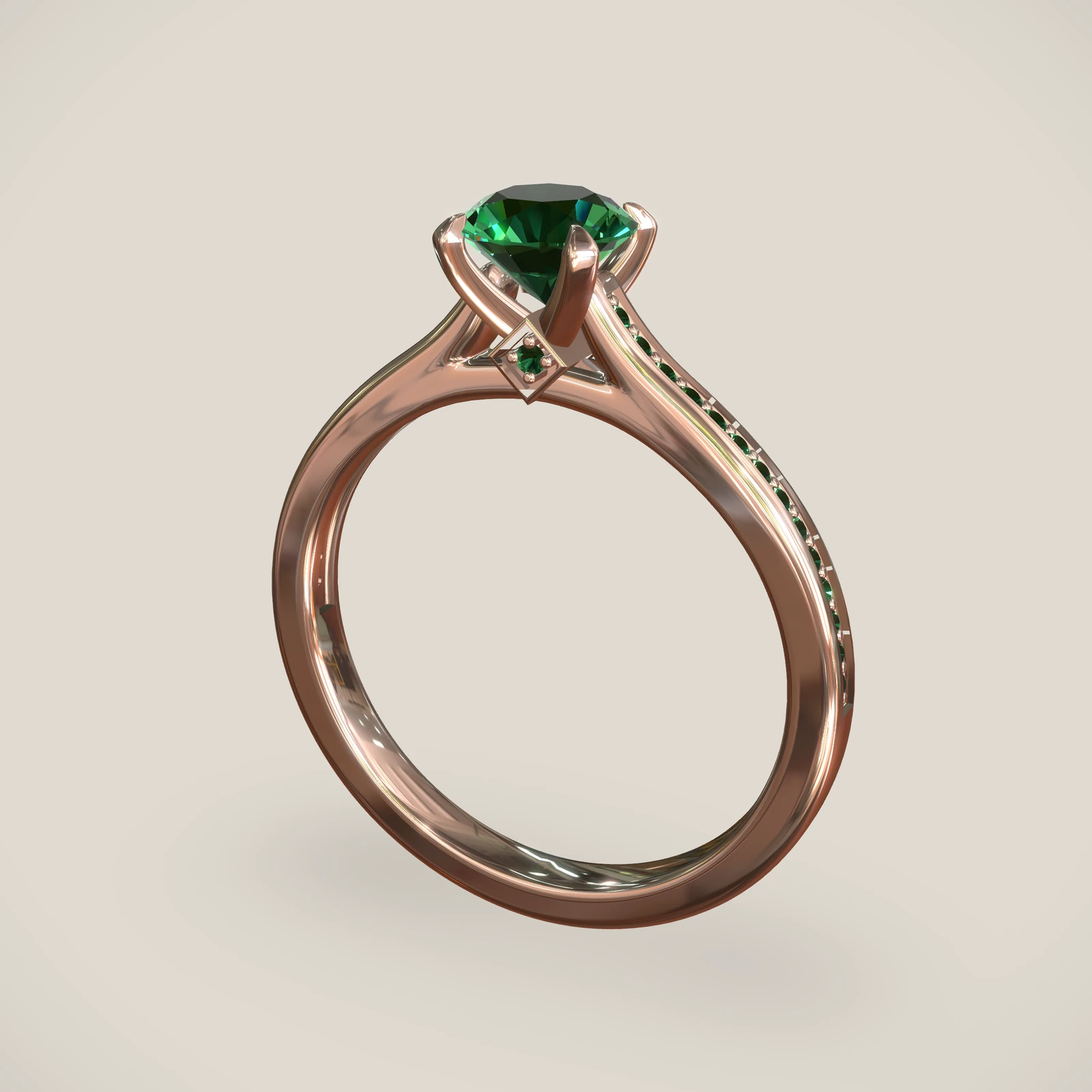 Charlotte engagement ring, shown in 18K Rose Gold with a Emerald
